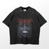 The Solo Leveling Statue of God T-Shirt features a dark anime design with a stylized face, sharp teeth, and intricate lettering. The phrase "Statue of God" is displayed at the bottom, giving the shirt a textured, worn look.
