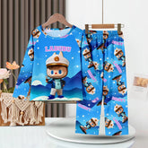 Meet the LABUBU Baby Pajama Set from LABUBU, crafted in soft milk silk. This blue set features a delightful LABUBU character in a white hat, surrounded by stars and mountains. It stylishly hangs on a wooden hanger against a striped wall with flowers nearby, boasting "Labubu" written on the fabric.