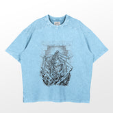 The Chainsaw Man Washed Vintage T-Shirt is a light blue oversized tee made from 260 GSM high-quality cotton. It features a rugged chainsaw figure graphic with "CHAINSAWMAN" in a stylized font, boasting a distressed, textured finish for an authentic anime streetwear vibe.