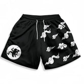 Black athletic shorts from Seakoff with Wano Country smoke pattern in black and white, featuring a dragon silhouette, white cloud designs, and a white drawstring for perfect adjustment.