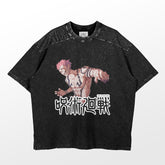 The Jujutsu Kaisen Sukuna Powerful Stance T-Shirt by Jujutsu Kaisen showcases an illustrated character with pink hair and tattoos in an anime style. Japanese text accents the design, while the fabric has a textured, worn look.