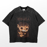 The Attack on Titan Beast Titan Funko Pop Style T-Shirt is black, shows a cartoonish Beast Titan-like character with fangs and a fierce look. Above is stylized text with Japanese characters, and the shirt has a distressed, vintage appearance.