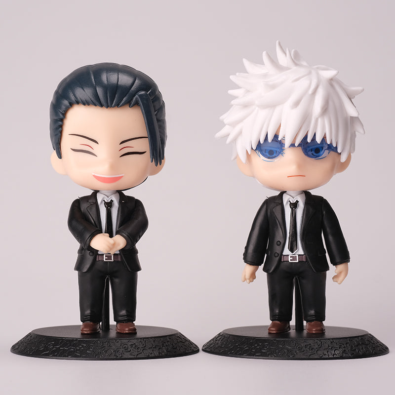 A Gojo Satoru & Suguru Geto figure set from Jujutsu Kaisen features them in black suits; Gojo with spiky white hair and blue glasses, and Suguru with slicked-back black hair, capturing their iconic expressions in this 10-piece action figure collection.