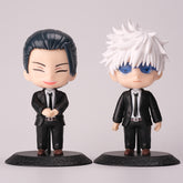 A Gojo Satoru & Suguru Geto figure set from Jujutsu Kaisen features them in black suits; Gojo with spiky white hair and blue glasses, and Suguru with slicked-back black hair, capturing their iconic expressions in this 10-piece action figure collection.