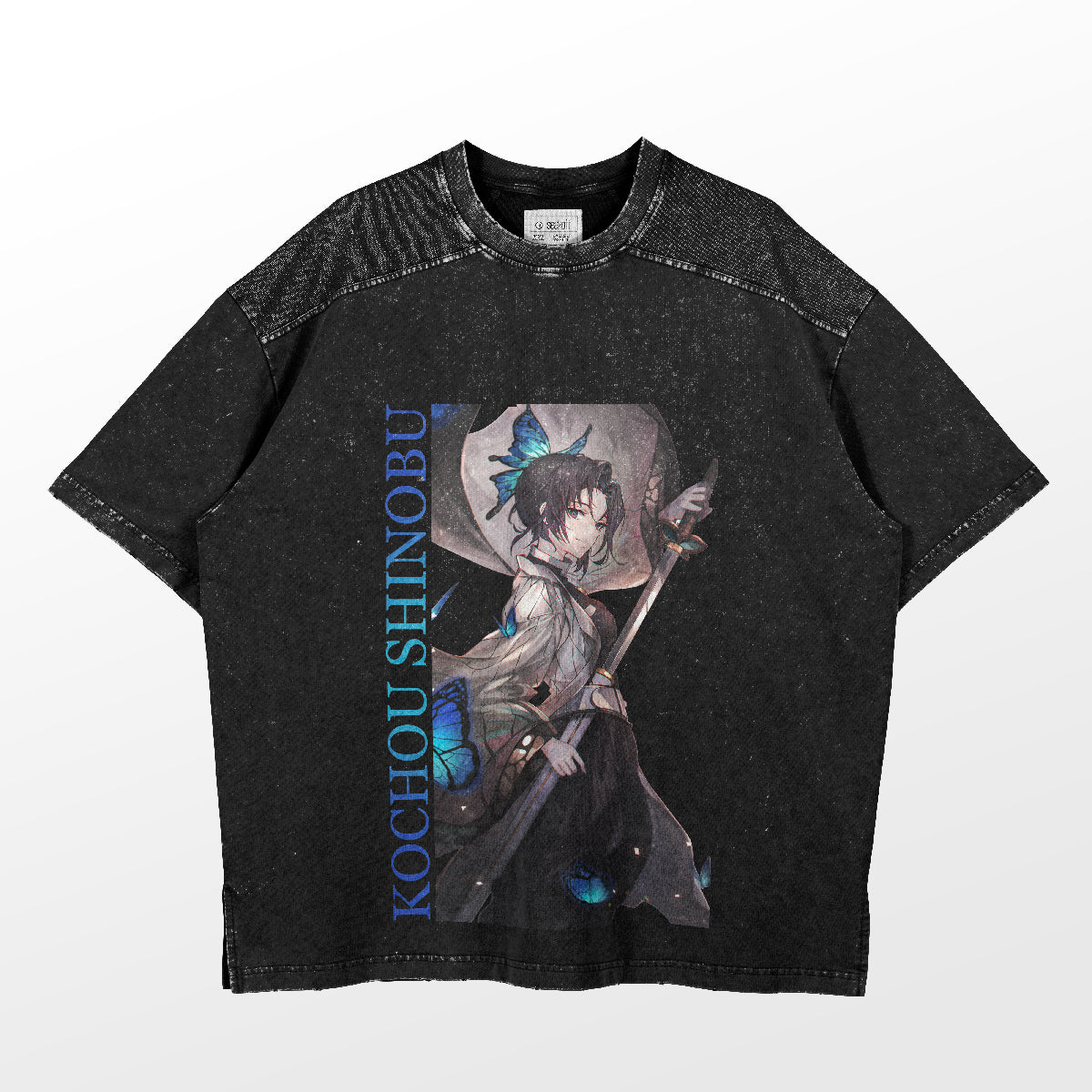 The Shinobu Kocho Butterfly Dance T-Shirt by Demon Slayer features a black design with an illustrated character in a white outfit and dark hair, text "Kochou Shinobu" in blue, and speckled texture with darker shoulders, inspired by the butterfly dance from Demon Slayer.