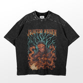 A black Sukuna Cursed Flames T-shirt from Jujutsu Kaisen features a bold graphic with intense figures, swirling flames, blue energy, and "Jujutsu Kaisen" in stylized lettering at the top.
