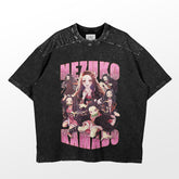 This black T-shirt from Demon Slayer features a dynamic design with vibrant characters. It prominently displays "Nezuko" at the top and "Kamado" at the bottom in large pink letters, capturing the essence of Demon Slayer.