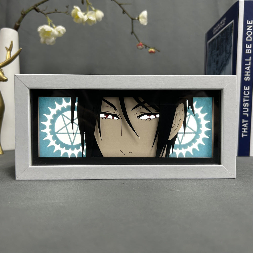The D.Gray-man Anime Light Box – Yu Kanda 3D Effect, from the D.Gray-man brand, showcases Yu Kanda with dark hair and light eyes. A geometric background features circular designs and a decorative branch with white flowers sits above this 16-color adjustable LED artwork.