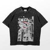 The Chainsaw Man Smash T-Shirt from the Chainsaw Man brand is a 100% cotton anime shirt featuring a graphic design of a dinosaur smashing through skyscrapers, with "SMASH" printed in bold white letters on a textured black background.