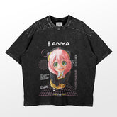 A black Spy × Family t-shirt with a colorful illustration of Anya Forger, featuring pink hair and large green eyes, the word "Anya," Japanese text, and retro grid designs from the high-quality Spy Family Anya Forger T-Shirt - Retro Grid Design collection.