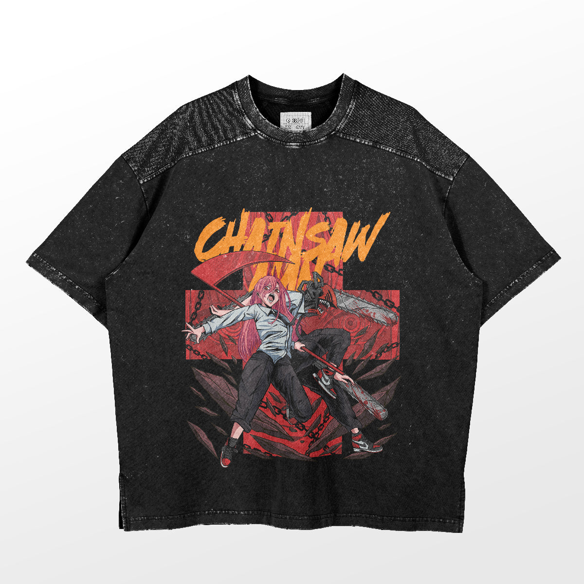 The black Chainsaw Man T-shirt features Denji and Power anime art on a red backdrop. "Chainsaw" is boldly printed in yellow above, with a speckled texture enhancing the style.