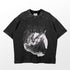 The Berserk-inspired graphic T-shirt is a washed black oversized tee, blending vintage streetwear with intricate linework of a kneeling knight presenting a sword to a seated figure, reminiscent of Berserk&
