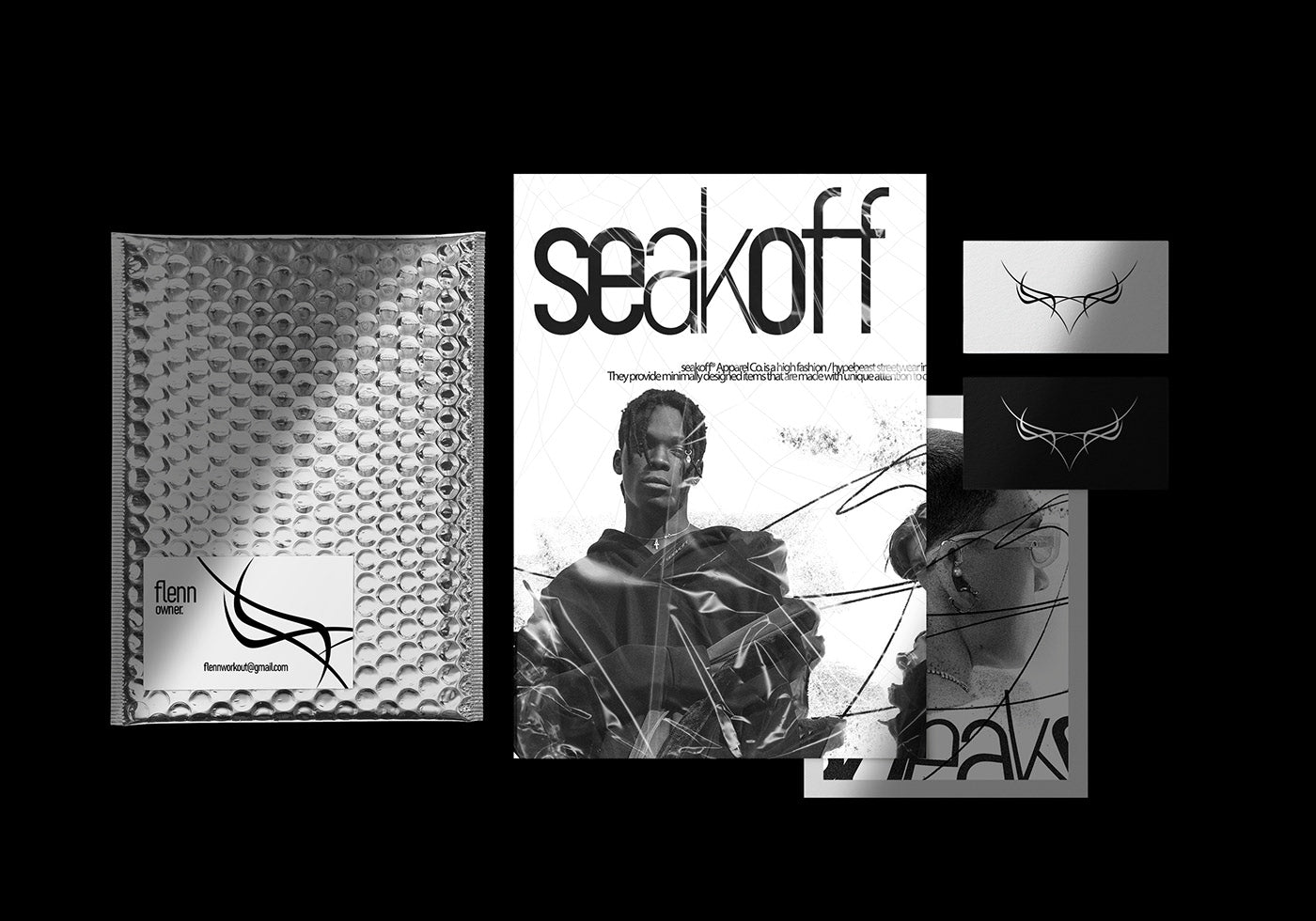 A display of branding materials featuring a metallic bubble mailer, a magazine cover with a model wearing a futuristic outfit, and business cards. The design includes abstract patterns and the text "seakoff.
