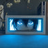 The Seakoff Noragami Anime Light Box – Yato 3D LED Lamp showcases a black-haired, blue-eyed character similar to Yato from Noragami. The piece includes an antler-like ornament and a partially visible book titled "SHALL BE DONE," enhanced by its dynamic color-changing effects.