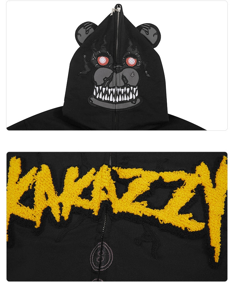 The Seakoff Dark Bear Demon Hoodie, made from 400GSM cotton, showcases a bear face on the hood with red mesh eyes and teeth. Perfect for horror fans, it features "KAKAZZY" in bold yellow embroidery on the front, making a strong impression.