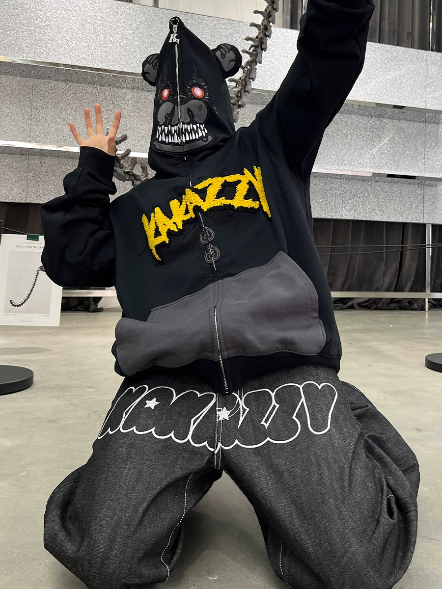 Kneeling indoors with raised hands, a person wears Seakoff&