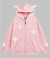 The Kawaii Star Elf Hoodie by Seakoff features 3D ears and soft star appliques, with white star-like patches and plush horns on the hood. A front zipper and two pockets add charm to this whimsical fashion piece, perfect for any kawaii-inspired outfit.