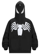 The Seakoff Venom Spider Hoodie is a 400GSM oversized black and white zip-up sweatshirt for superhero fans, featuring a full-face zipper, white eye-like designs on the hood, and a bold Spider Emblem graphic across the chest. Perfect for streetwear enthusiasts.