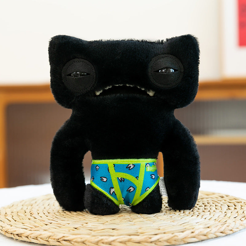 22 cm Black Monster Plush – Furry Creature Soft Toy with Blue Pattern Shorts