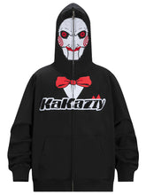 The Seakoff Saw-Inspired Hoodie is a 400GSM oversized black zip-up perfect for horror fans, featuring a Billy the Puppet-style face with red eyes, swirled cheeks on the hood, a red bowtie design, and "Kakazzy" across the chest.