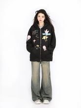 Against a plain white background, a person showcases their anime-inspired fashion with long dark hair, white sneakers, and baggy jeans while wearing Seakoff&
