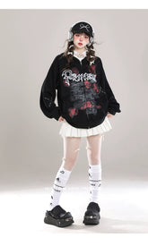 Dressed in a Seakoff Gothic Hello Kitty Princess Hoodie, a white pleated skirt, and black platform shoes, a person stands against a gray backdrop. Embracing kawaii fashion with long braided hair, they&