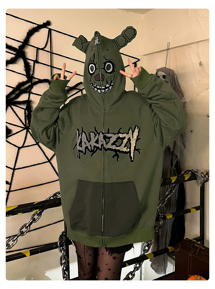 Clad in the Springtrap-Inspired Hoodie by Seakoff, a person embodies the eerie charm of Five Nights at Freddy&