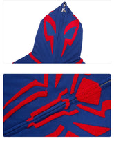 The Seakoff Superhero Spider Hoodie is a blue and red oversized zip-up sweatshirt with eye-like red shapes on the hood, black mesh insets, and a striking spider emblem on the chest. It&
