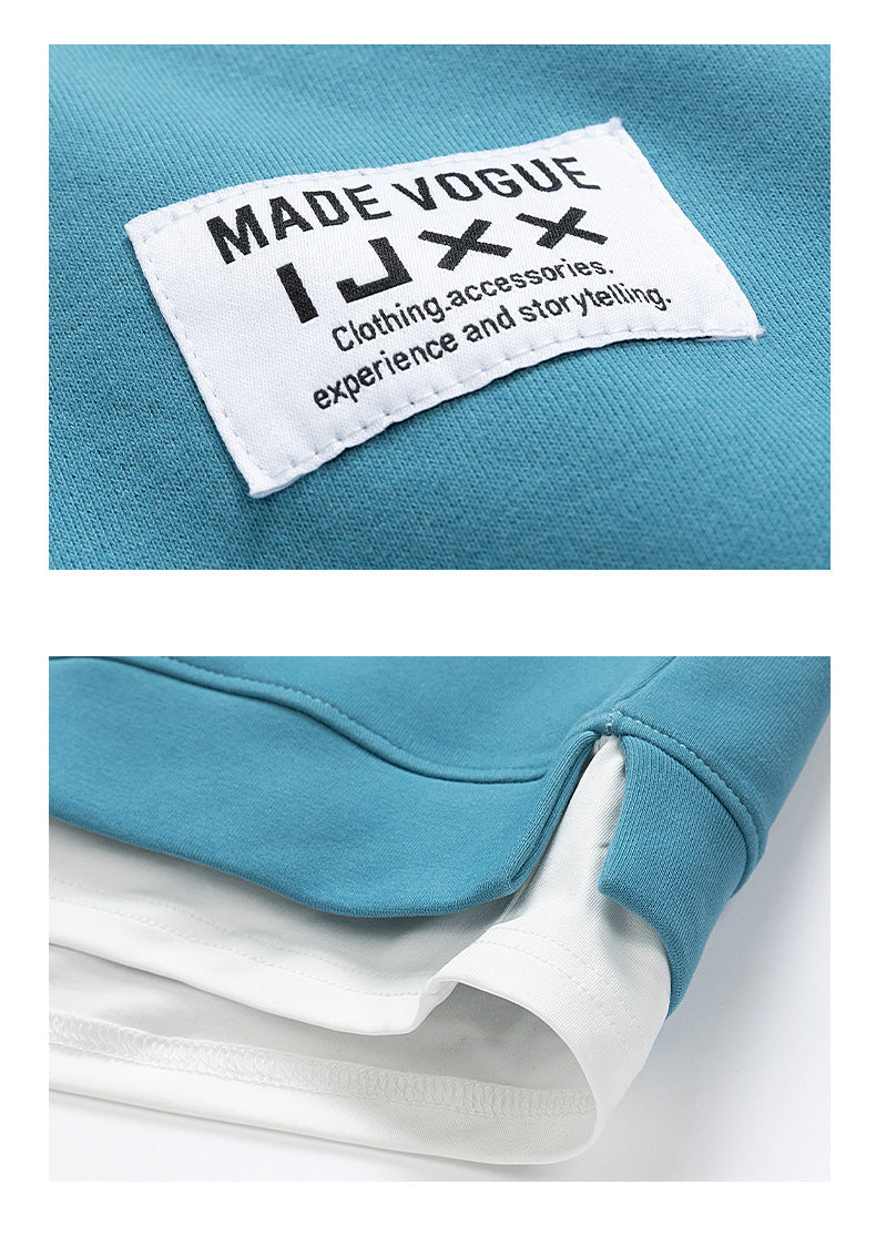 Close-up of blue fabric featuring a white label reading "SEAKOFF" and "Clothing accessories, story & experience." Below, the folded edge unveils a white lining reminiscent of anime style, embodying the essence of the Limited Edition Dragon Ball Sweatshirt - Goku Spirit Bomb Gradient Design.