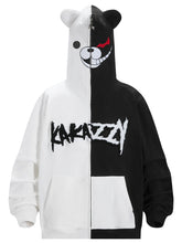 The Seakoff Monokuma-Inspired Hoodie is a must-have for Danganronpa fans, boasting a split black-and-white design, a stylized bear face on the hood, and "KAKAZZY" on the front. The asymmetrical mischievous bear expression adds an edgy flair.
