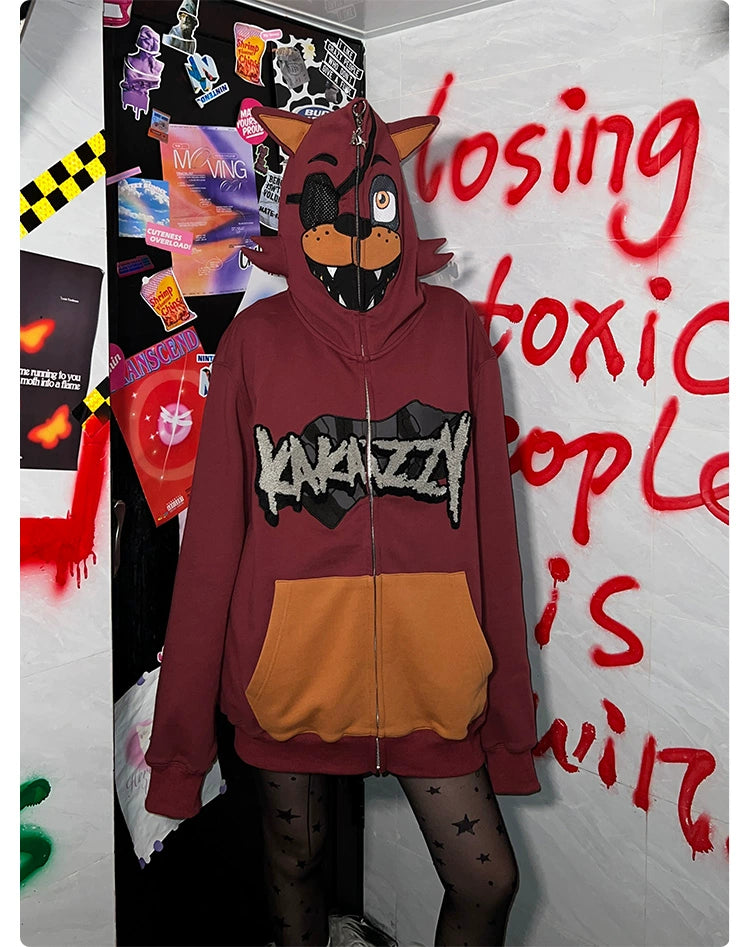 A person wearing a Seakoff Foxy-Inspired Hoodie, a 400GSM oversized red zip-up Five Nights at Freddy&