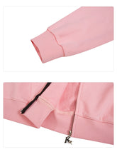 Close-up of the Seakoff Batman-Inspired Hoodie - 400GSM Oversized Pink Zip-Up Superhero Sweatshirt, highlighting the ribbed cuff and bottom hem with a zipper pull. The soft fabric is perfect for superhero fans.