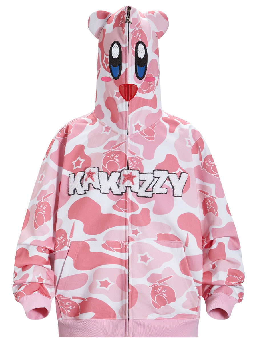 The Seakoff Pink Kirby-Inspired Hoodie features a cartoon face on the hood with large eyes, red mouth, playful 3D ears, white and pink patterns with star motifs, and "KAWAZZY" across the chest over a unique pink camo print. Made from 400GSM cotton.