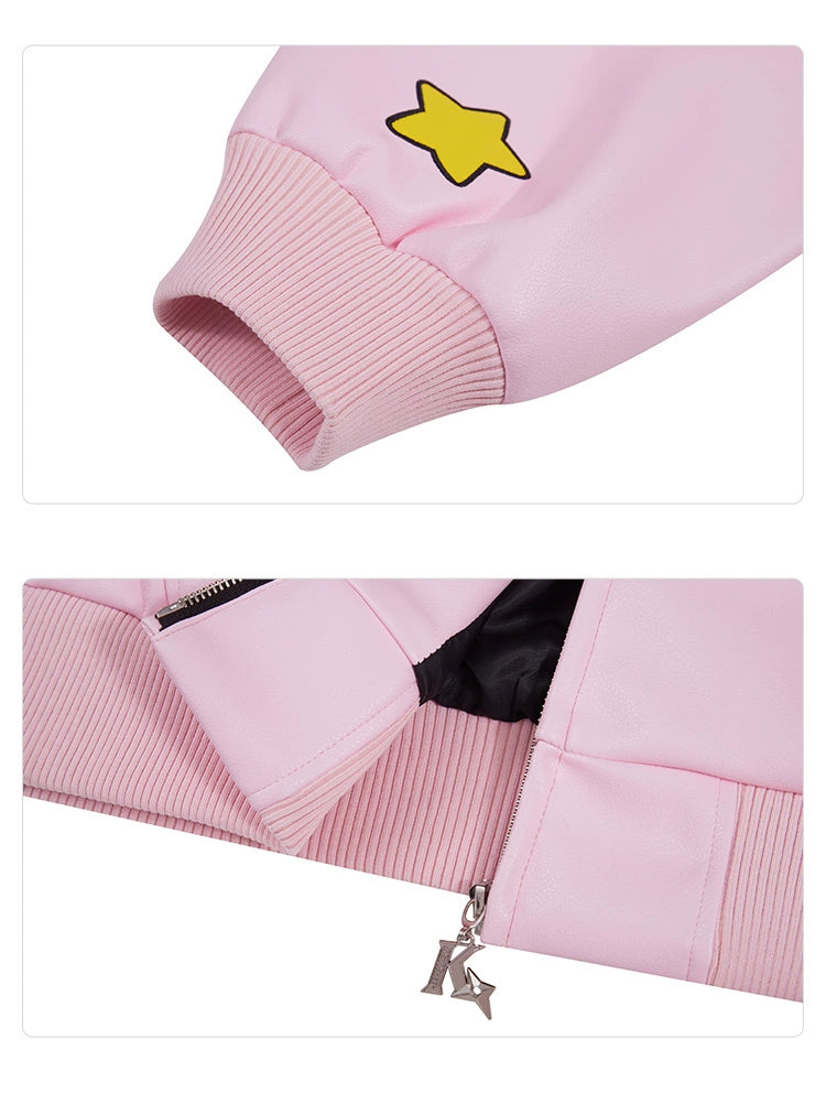 Close-up of the Kirby Pink Hoodie by Seakoff, a 400GSM oversized anime zip-up sweatshirt. It features streetwear style with sleeve detail displaying a yellow star patch, while another close-up shows the collar and zip pull with a dangling metal "R" charm, ideal for anime fans seeking unique flair.