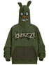 The Seakoff Springtrap-Inspired Hoodie is an oversized green zip-up sweatshirt featuring a cartoon monster face with big eyes and sharp teeth. Perfect for horror game fans, it has "KARAZZI" embroidered in jagged font, evoking Five Nights at Freddy&
