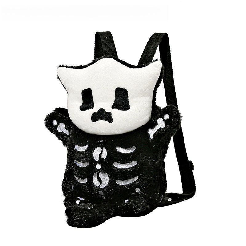 The Spooky Skeleton Plush Backpack by Seakoff features a fun, creepy-cute design with a cartoon skeleton cat, black body, and white bone details. Its sad expression and Halloween vibe make it stylish and functional, complete with comfy black straps for carrying.