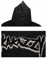 The image shows the Berserk-Inspired Griffith Dark Knight Hoodie, a 400GSM Black Zip-Up Oversized Streetwear piece by Berserk. It features a hood with a menacing mask and red eyes, echoing the dark knight&