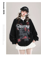A person wearing headphones and the Seakoff Gothic Hello Kitty Princess Hoodie – an oversized zip-up with edgy heart and cross graphics – paired with a white skirt, captures kawaii fashion. The neutral gray background adds alternative charm, with "Autumn NEW" text beside.