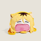 The Seakoff Miya Atsumu Plush Shoulder Bag is essential Haikyuu!! merchandise for fans, featuring a cartoon face with cat-like ears, light brown hair, and a transparent mouth pocket. The yellow bag has a pink and white surprised expression face with matching yellow straps.