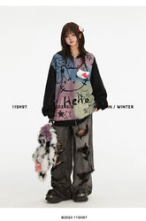 Dressed in an oversized Pastel Cat Graffiti Hoodie by Seakoff, paired with baggy ripped jeans and plush slippers, a person radiates streetwear vibes. Holding a stuffed animal, they embody kawaii charm. Image text: "11SH97 2023/S Autumn/Winter @2024 11SH97.