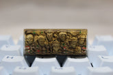 The Hokage Monument Keycap by Naruto is a custom spacebar keycap featuring carved Hokage faces. It boasts a detailed beige and brown design that fits Cherry MX switches on white keyboards, perfect for any fan of Naruto.