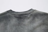 The back of the Limited Edition Death Note Long Sleeve Shirt in a black & gray gradient with distressed design and artistic hem showcases the neckline and shoulders, embodying anime streetwear style.
