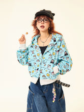 A red-haired person sports a black cap, round glasses, wide-leg jeans, and a whimsical streetwear look featuring Seakoff&