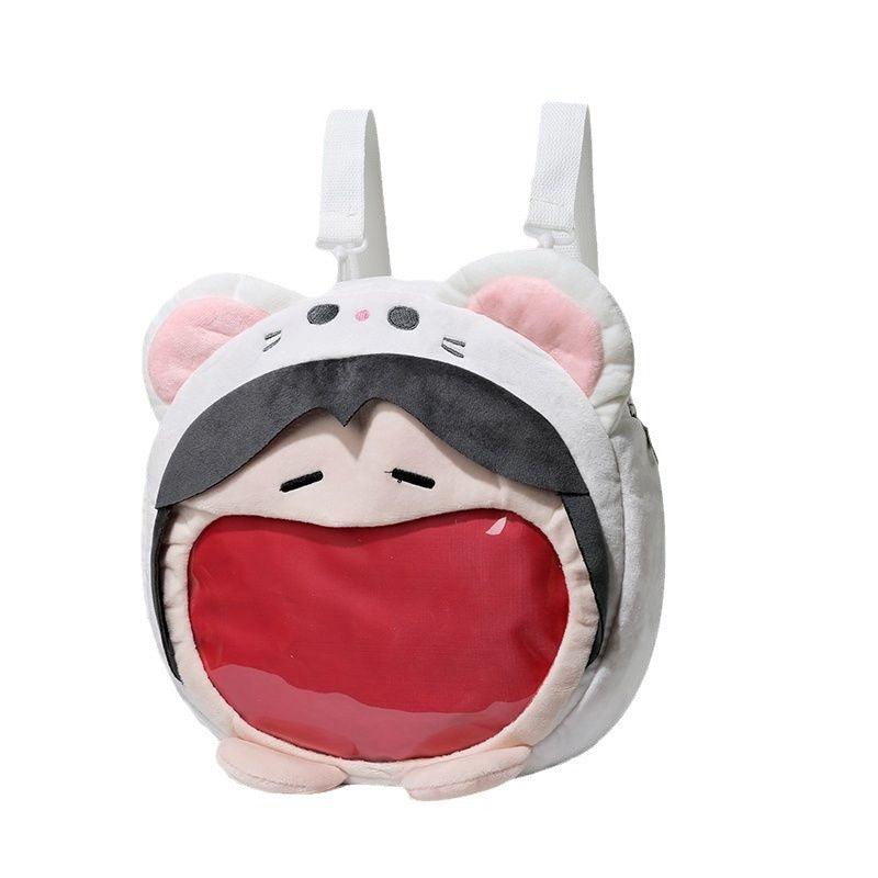 The Seakoff Adorable Cat Hoodie Plush Bag boasts a fun cat face design, soft fabric, rounded ears, and a transparent mouth-shaped red pocket. This plush shoulder accessory features white adjustable straps, making it one of the cutest bags you&