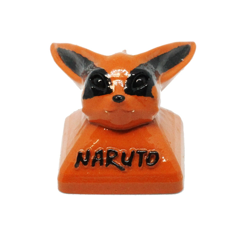 Enhance your setup with the Kurama Naruto Keycap—an orange chibi-style Nine-Tails Fox featuring large ears, eye markings, and "NARUTO" on the base. Perfect for fans with Cherry MX switches.