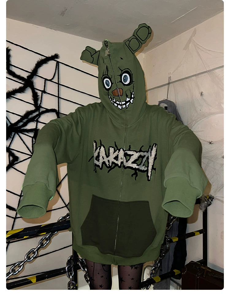 A person wears a Seakoff oversized green zip-up hoodie, inspired by Springtrap from Five Nights at Freddy&