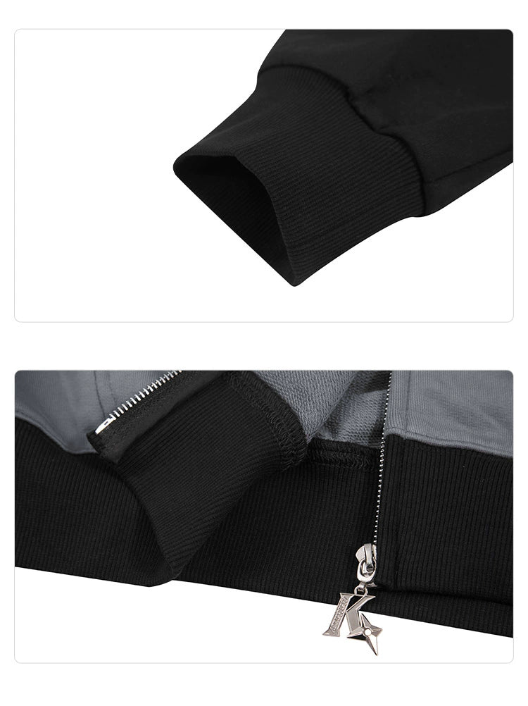 Photos of the Seakoff Batman-Inspired Hoodie, a grey and black oversized zip-up sweatshirt. The top image shows a ribbed sleeve cuff, while the bottom highlights the silver "K"-shaped zipper pull tab, ideal for superhero streetwear enthusiasts.