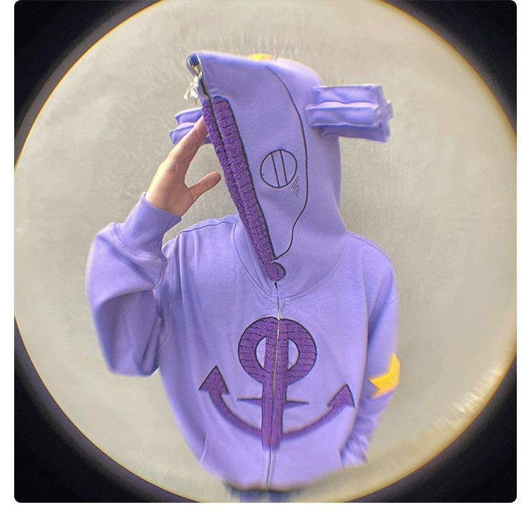 A person in a Seakoff Purple Symbol Hoodie, an oversized 400GSM Anime Zip-Up Sweatshirt, flaunts star and ear designs with arrows and circles. Their face is obscured by the zipped hood. Yellow accents on the sleeves enhance its street-chic vibe against a blurred backdrop.