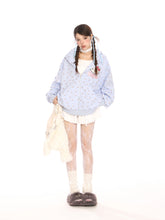 A person stands against a white backdrop in kawaii fashion, wearing Seakoff&