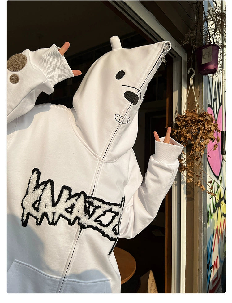 Someone is sporting a Seakoff Cute White Bear Hoodie - 400GSM Polar Bear Design with black embroidery, featuring "KANAZZ" across the front and a zipper to the hood&